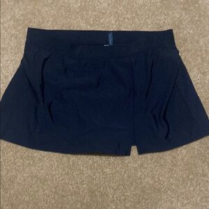 NWOT. Black swimsuit skirt. Size large. Aqua Green brand.